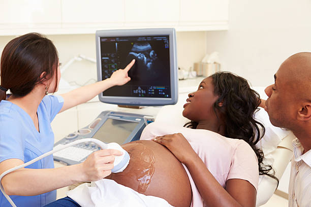 pregnant woman attending prenatal appointment in the United States